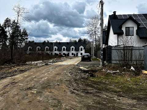 ділянка за адресою Ольжича