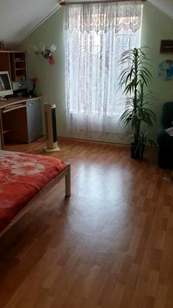 Торгова вулиця, 12