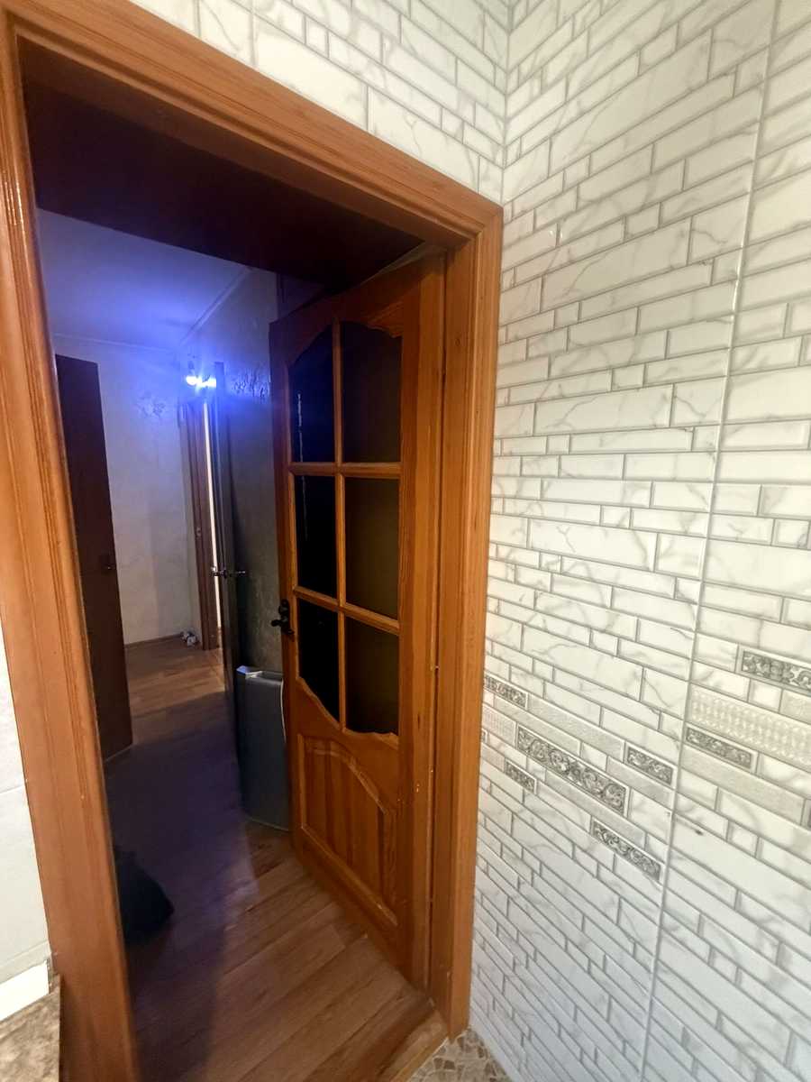 1875397846611875