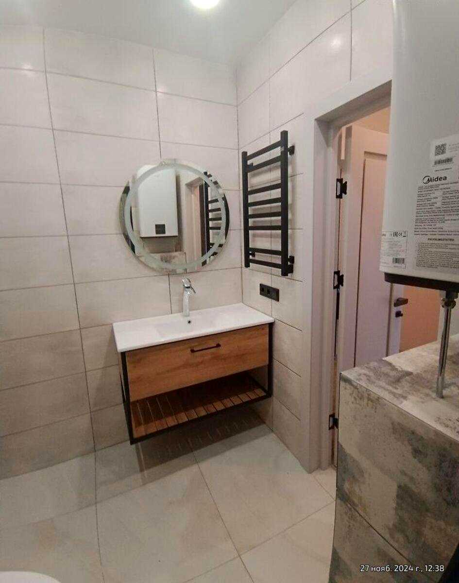1877193565067987