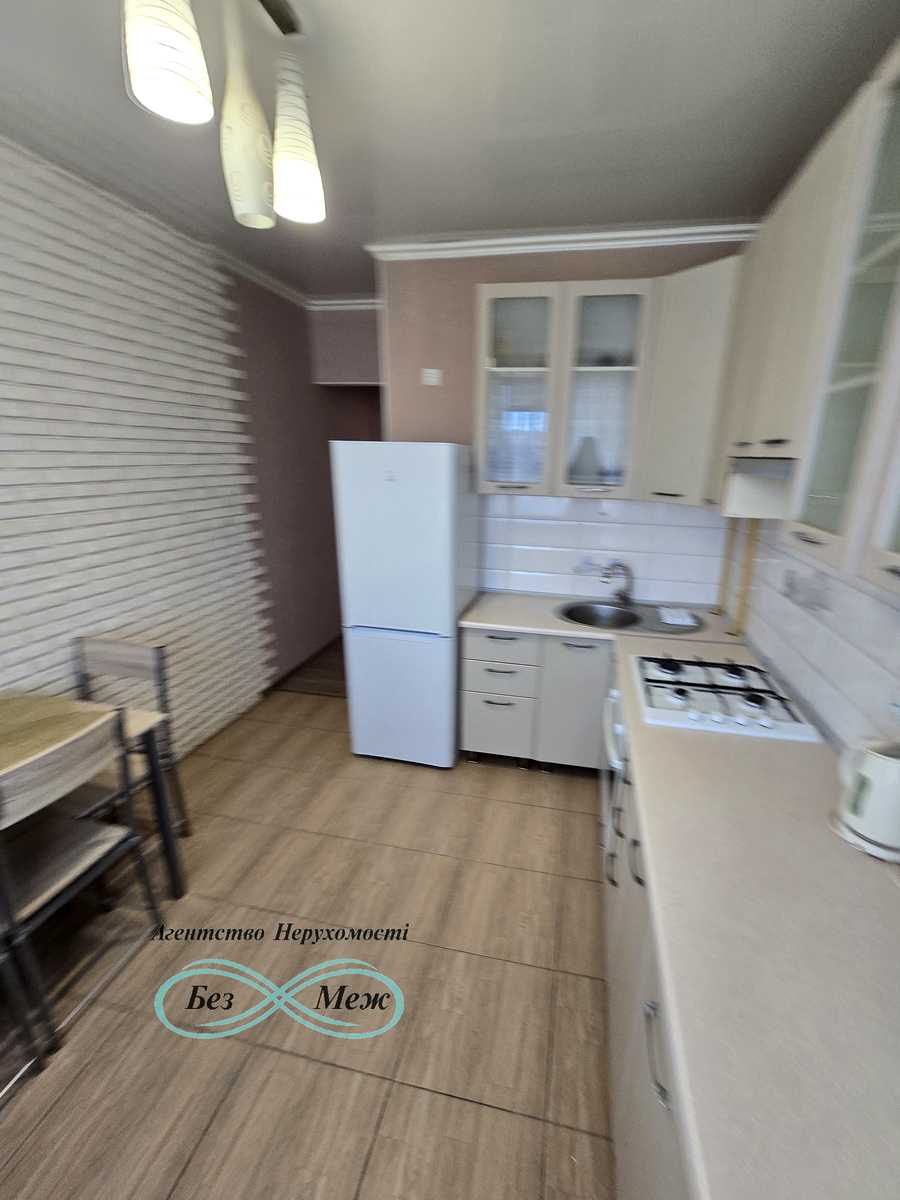 1877860813559459