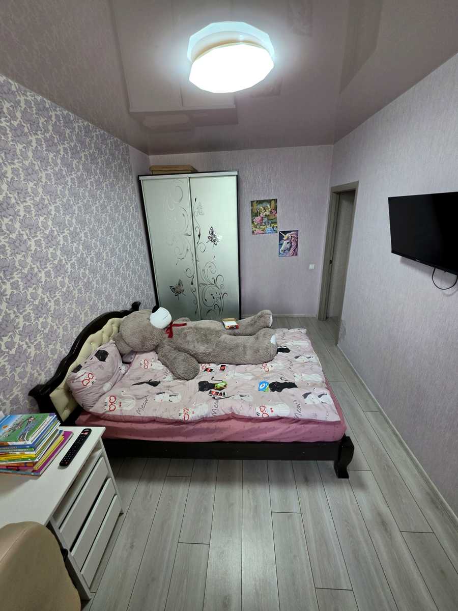 1879784398843650