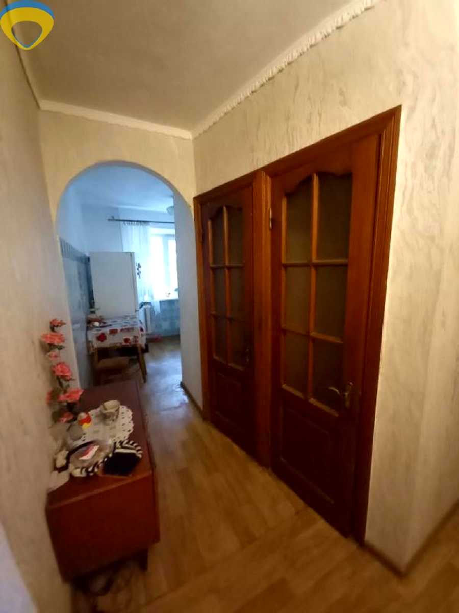 1879831611674857